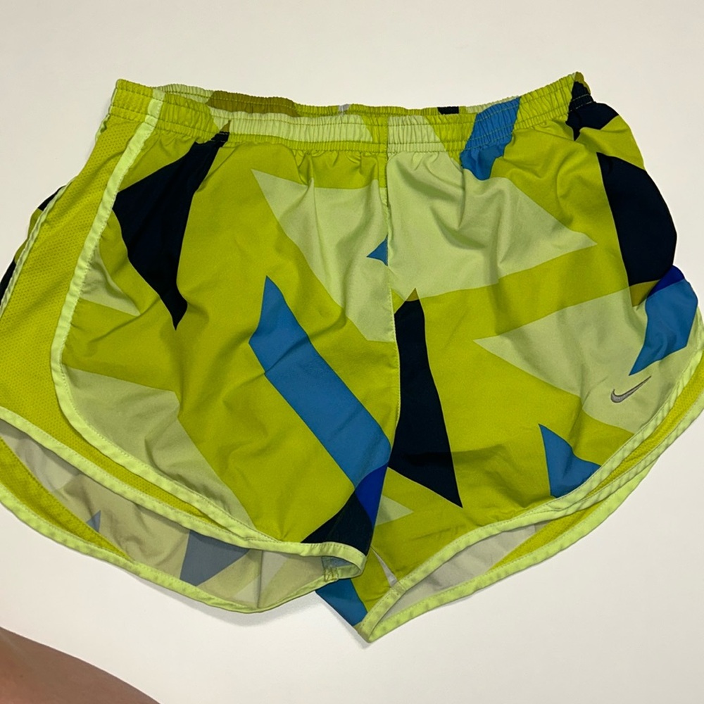 Women’s green and blue Nike running shorts with geometric design. Size Large